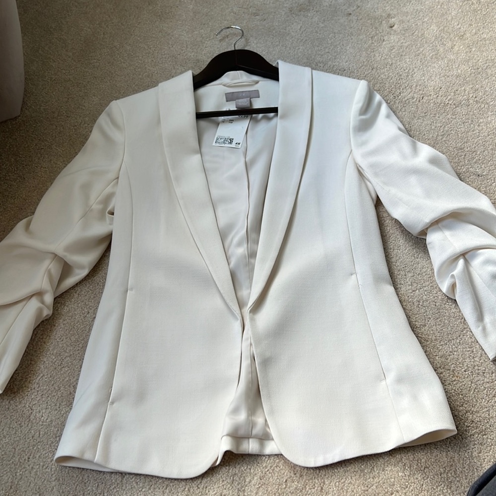 White blazer with gathered sleeves